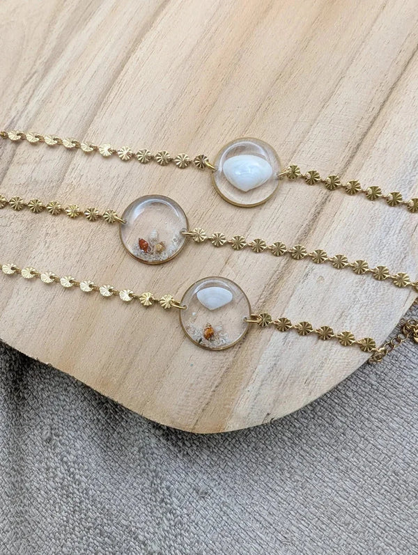 Bracelet doré coquillage